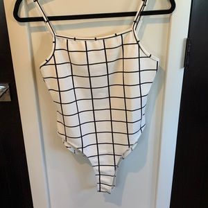 Black and white Shein body suit.